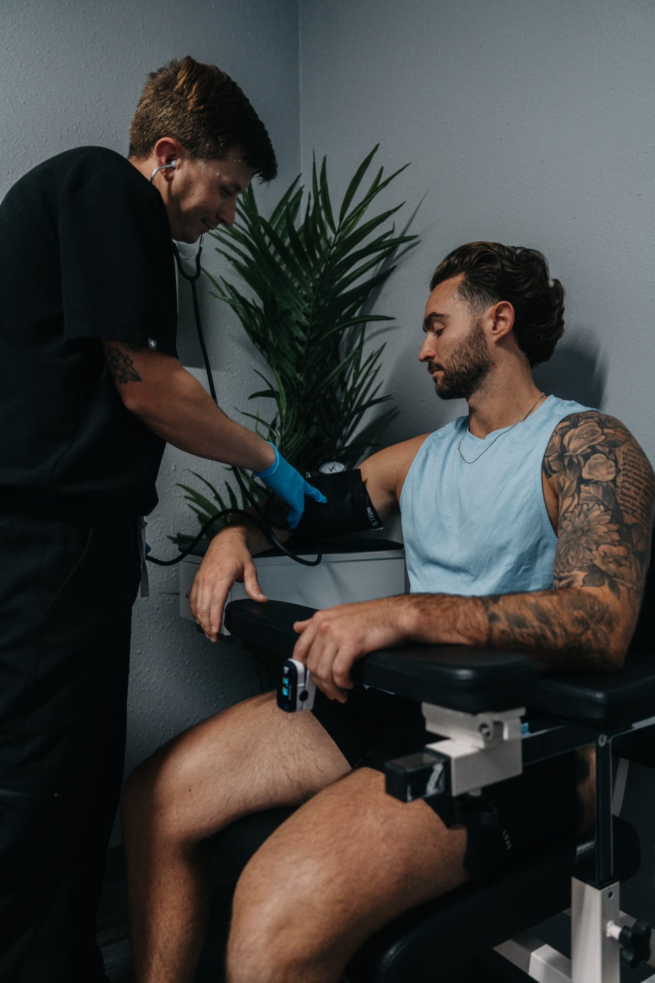 Arsenal Health clinician reviewing comprehensive bloodwork results with a patient