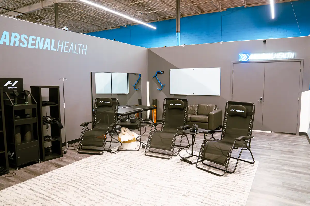 Recovery lounge with zero gravity chairs at an Arsenal Health facility